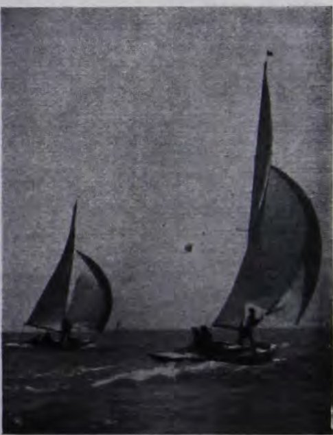 (Right) Gybing: Robelia (R) has just gybed and keeps her spinnaker drawing all the time. Yola’s spinnaker is beginning to collapse. [F. J. Armes]