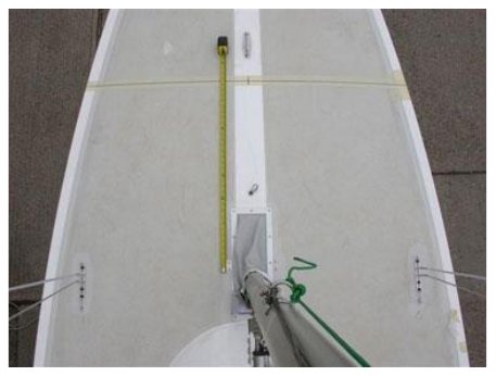 Measuring from the station 4 line to the aft end of the mast measurement plate (step 7).